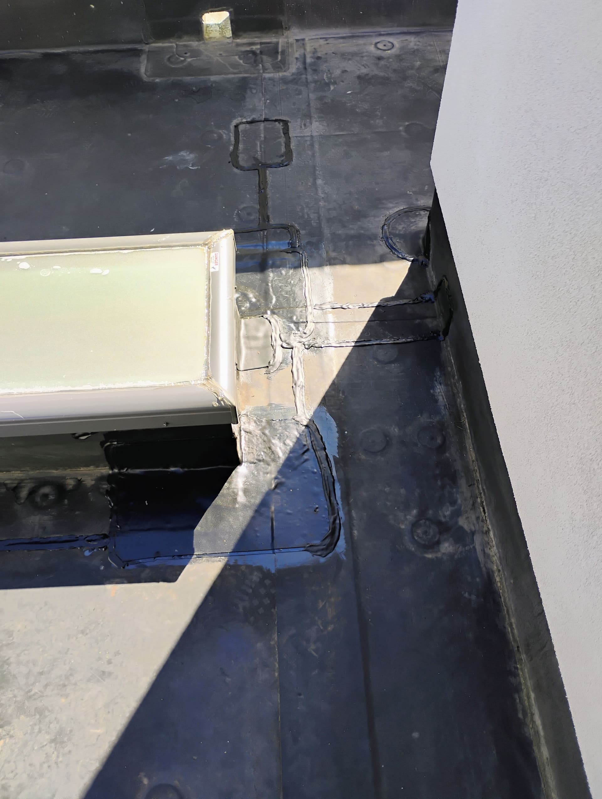 Flat EPDM Roof Leak Repaired and Sealed Right image