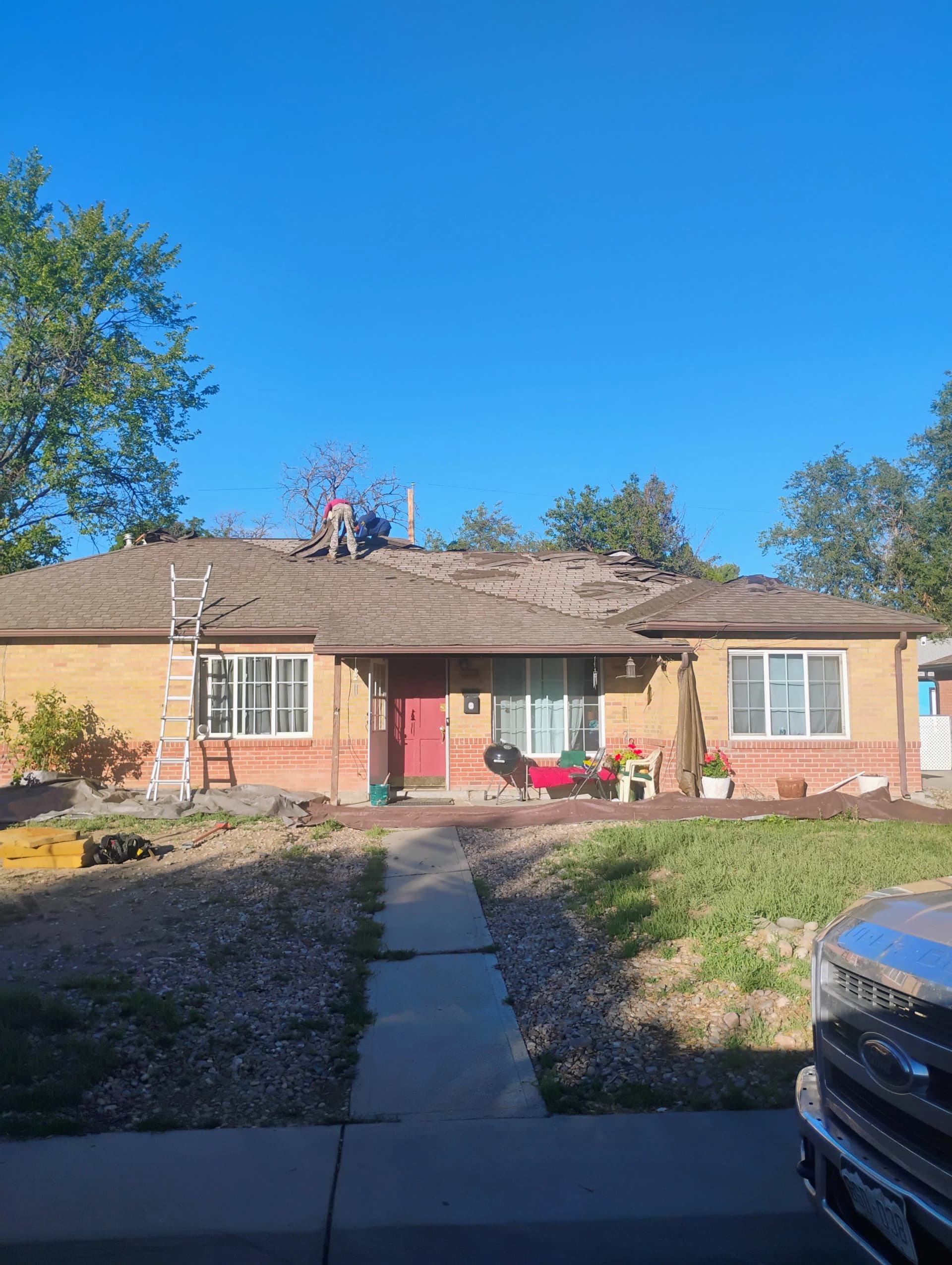 Old Shingles Out, Fresh Roof Going In image