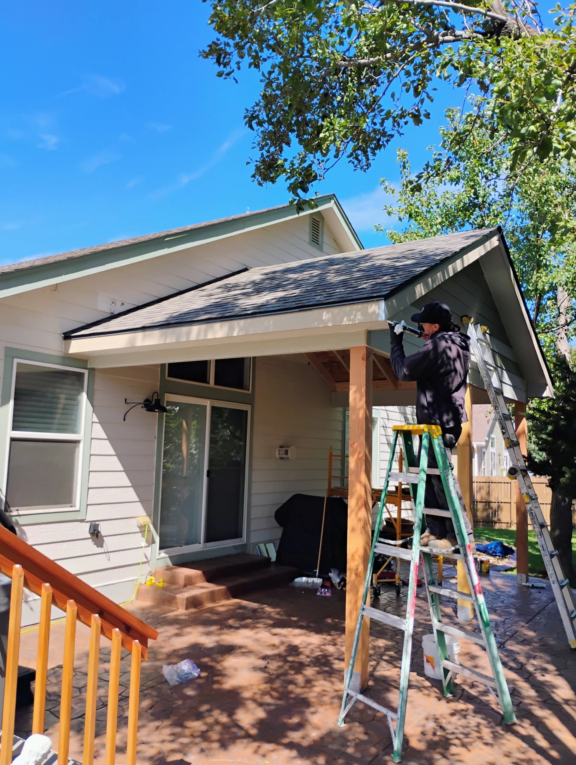 Full Exterior Overhaul Roofing Gutters and Fresh Paint image