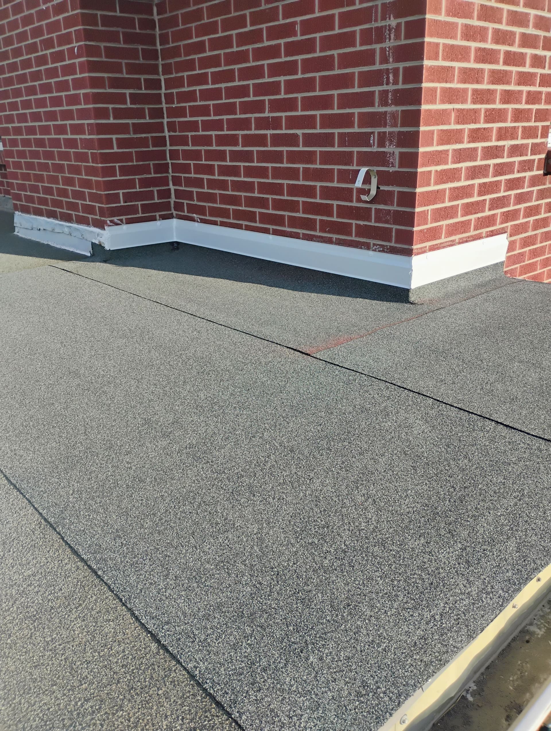 Modified bitumen flat roof repair done right image